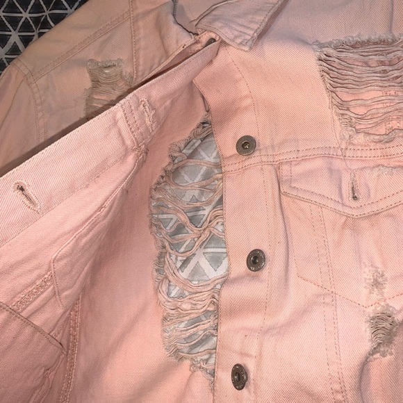pink ripped jean jacket